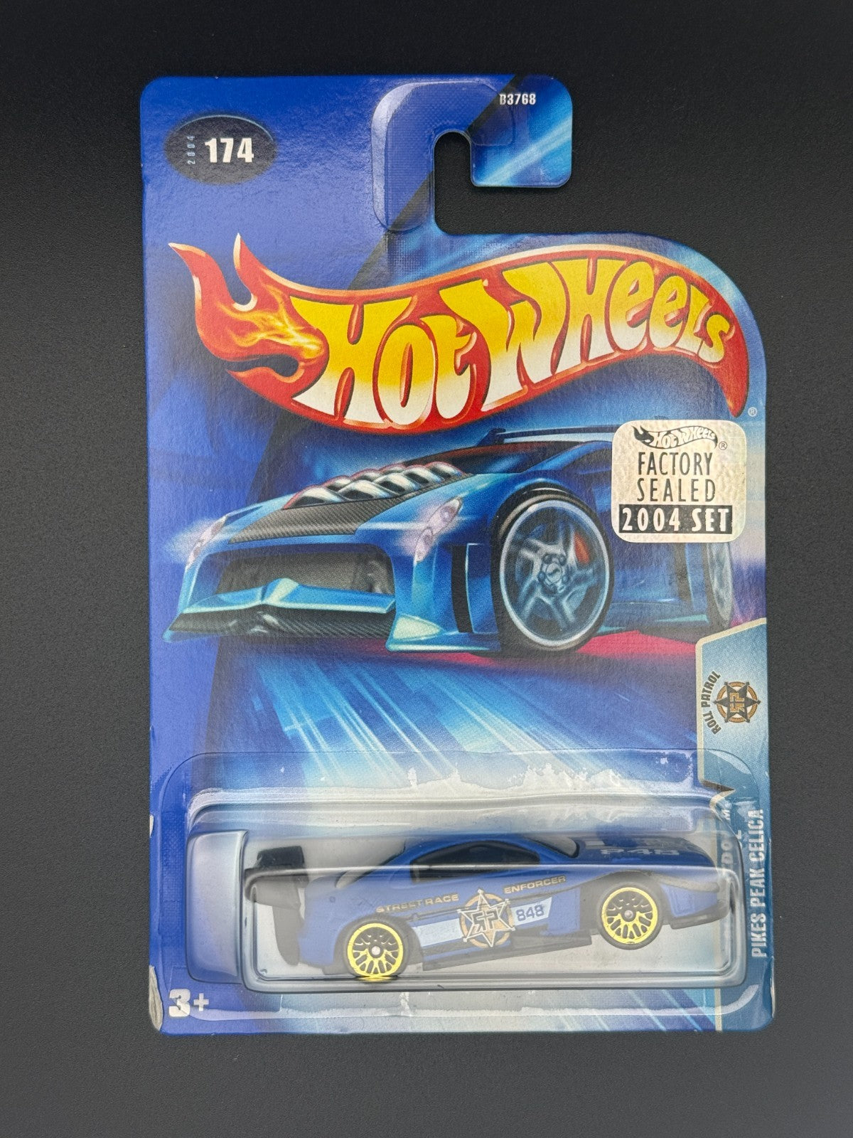 Hot Wheels Pikes Peak Celica Roll Patrol Factory Sealed 2004 Set w Protector